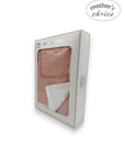 Packaged baby blanket with 'mother's choice' branding on a white background
