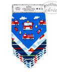 Packaged bandana bib with fire truck design on a white background