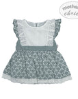 Children's dress with floral pattern and lace details on a white background, branded 'Mother's Choice'.