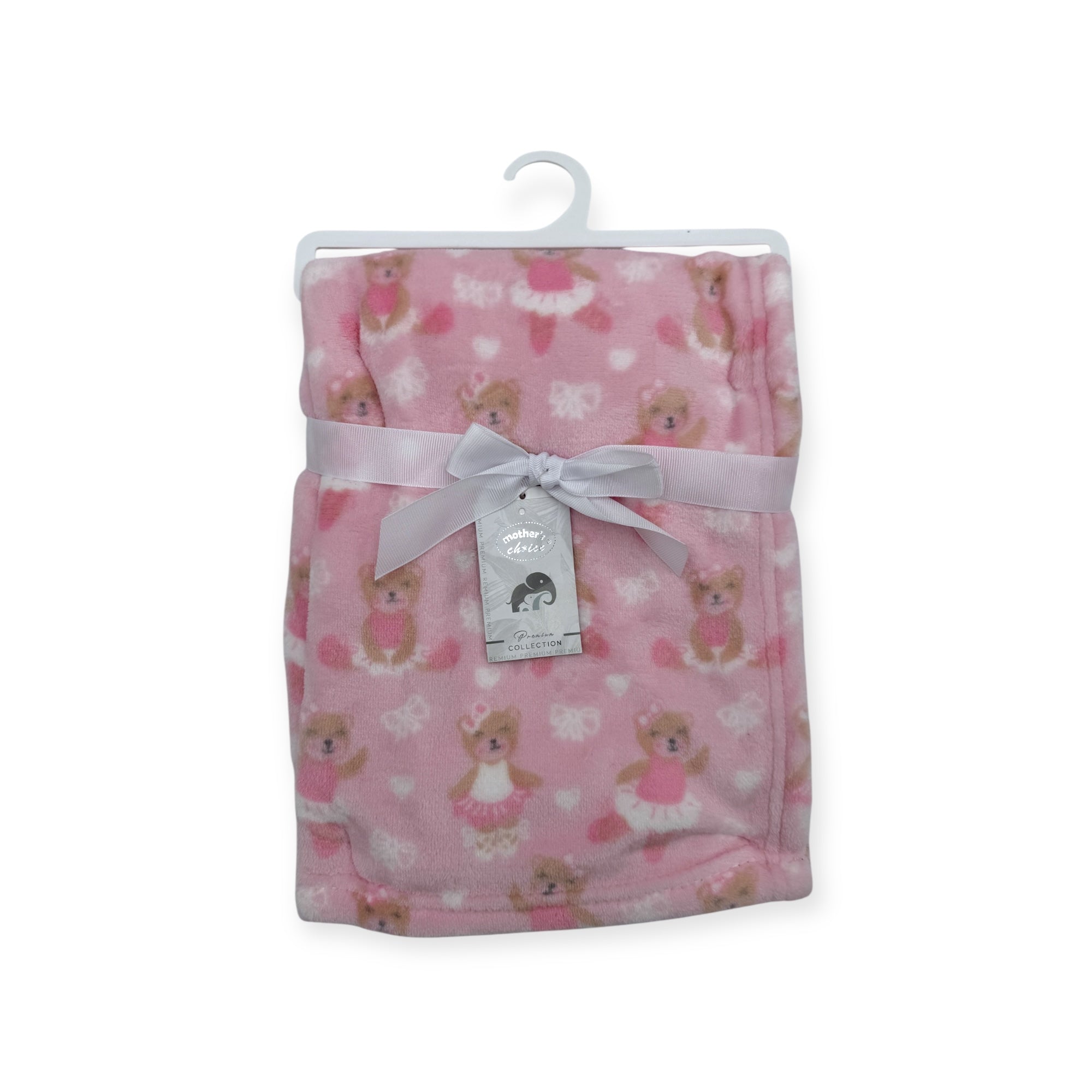 Pink baby blanket with teddy bear pattern on a white background