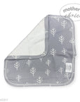 Gray baby bib with white tree pattern on a white background, branded 'Mother's Choice'.
