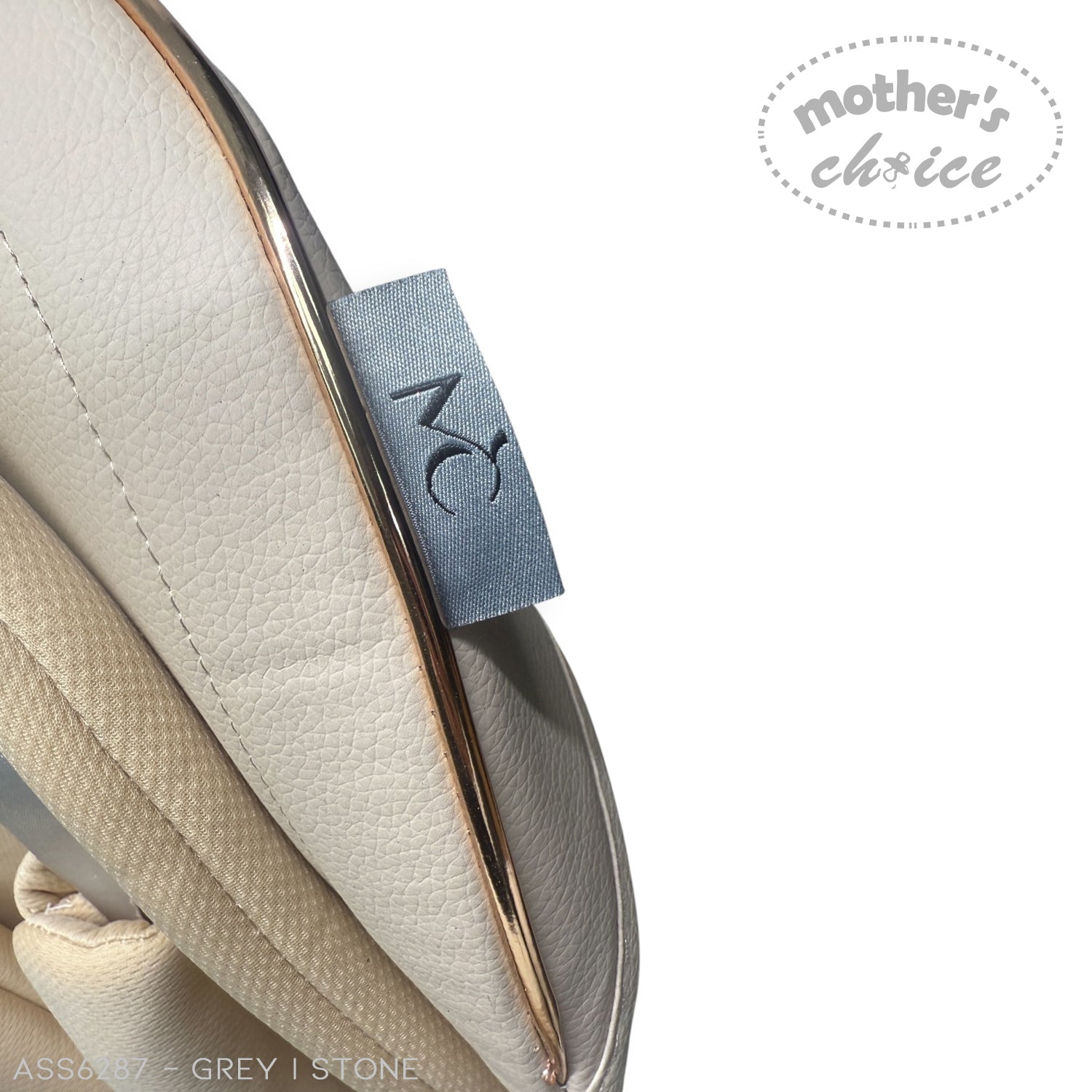 Close-up of a beige baby seat with a 'mother's choice' tag on a white background