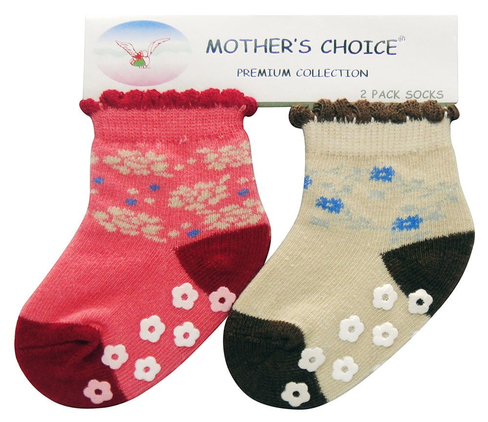 Two pairs of baby socks with floral patterns on a 'Mother's Choice' branded card.