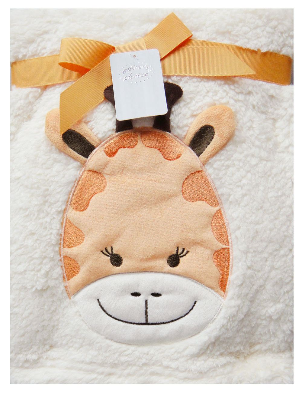 Plush giraffe toy with a tag on a textured white background