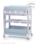 Stork And Baby baby bath caddy with blue star print changing mat, storage compartments, and rolling wheels