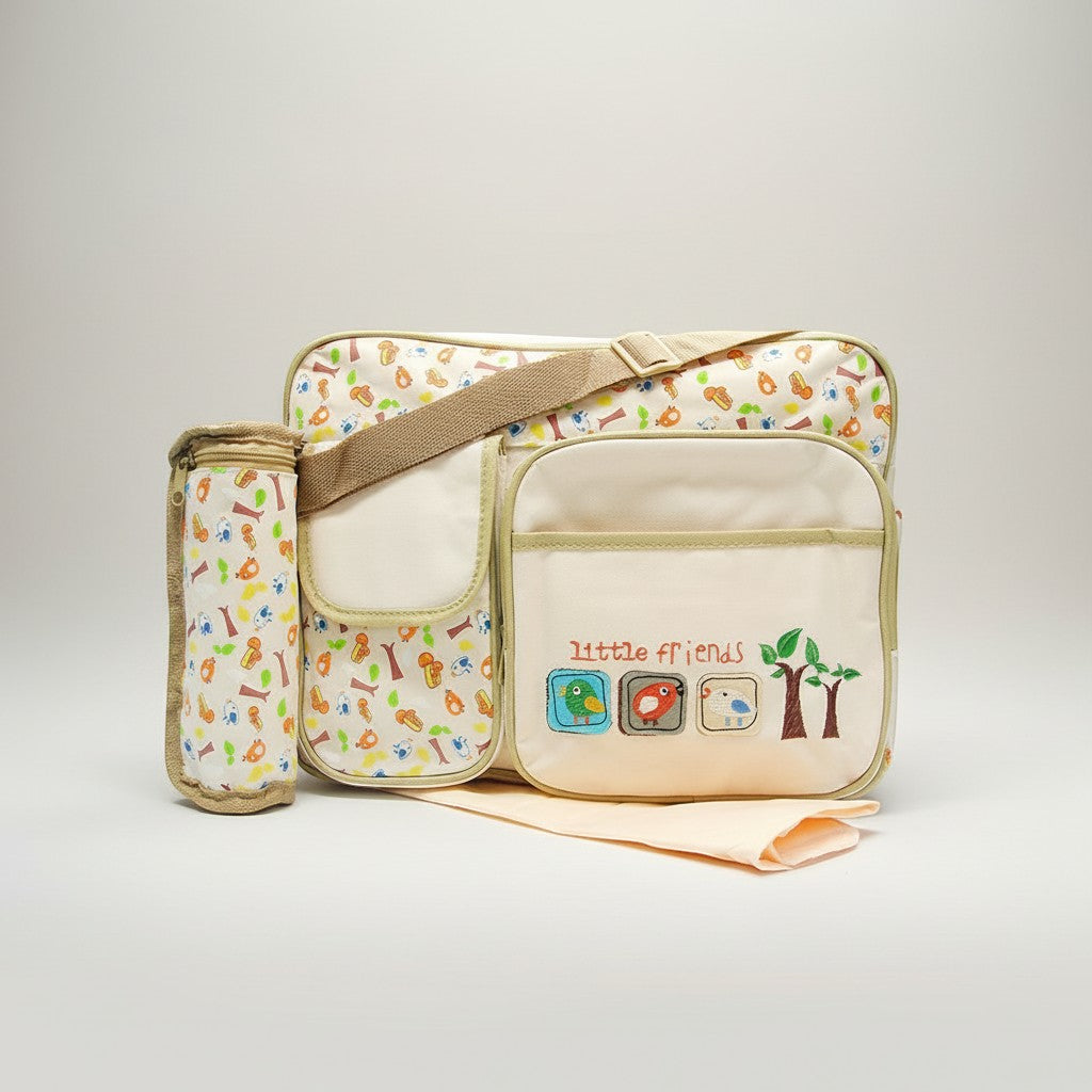 Stork And Baby beige diaper bag with a playful 'Little Friends' print featuring birds and trees. Includes a bottle holder.