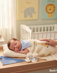 Stork And Baby blue striped bib and penguin socks set for baby, soft cotton, ideal for feeding and daily wear.