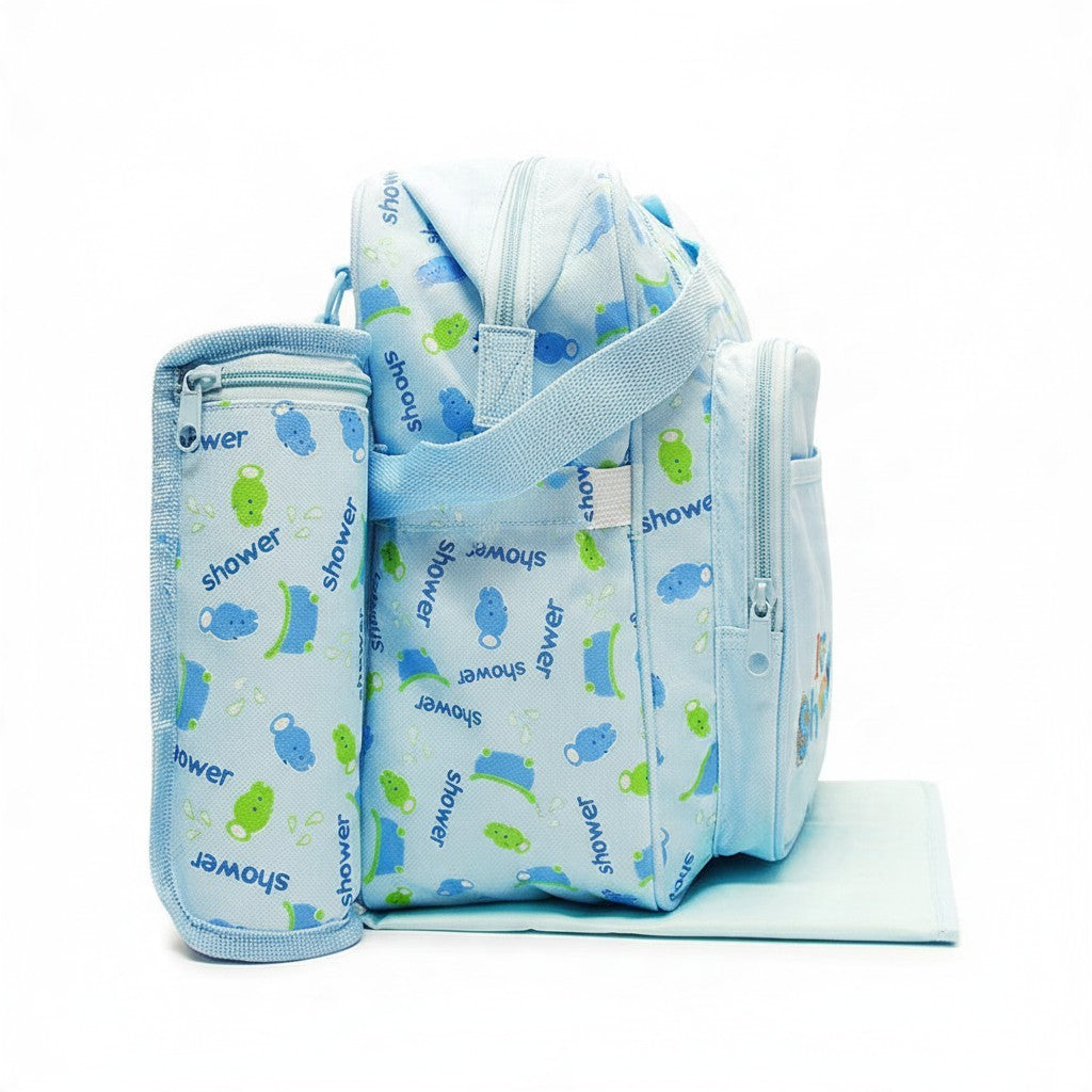 Stork And Baby Mothers Choice blue diaper bag with I Love Shower print, featuring outer pockets and bottle holder.