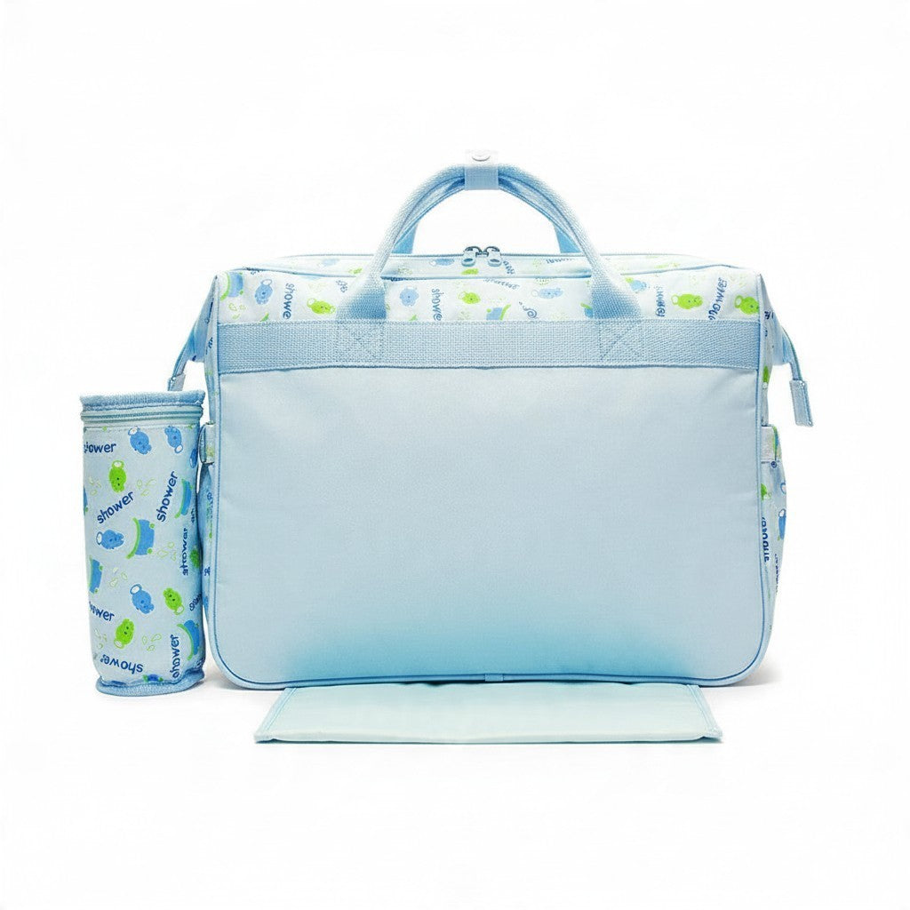 Stork And Baby Mothers Choice blue diaper bag with two outer pockets, matching bottle holder, and baby print pattern.