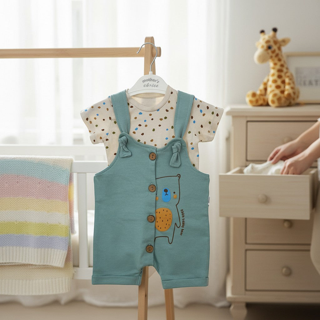 Stork And Baby blue cotton blend 2-piece baby dungaree set with a bear graphic and a polka dot t-shirt.