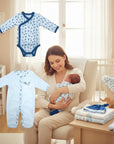 Stork And Baby blue and grey leaf print 100% cotton baby boy starter pack with kimono onesie and footed pajamas.