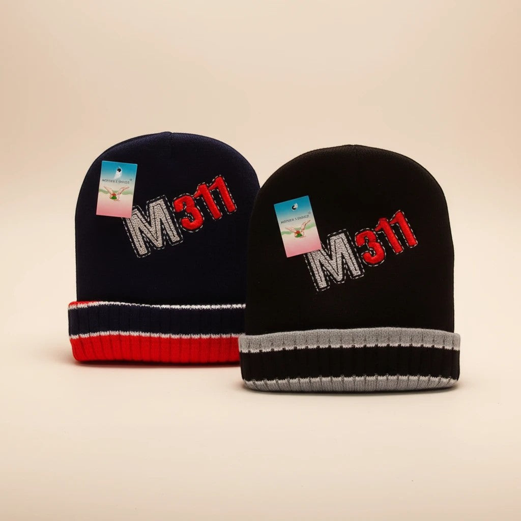 Stork And Baby navy and black knit beanies with red and grey trim, featuring embroidered M311.