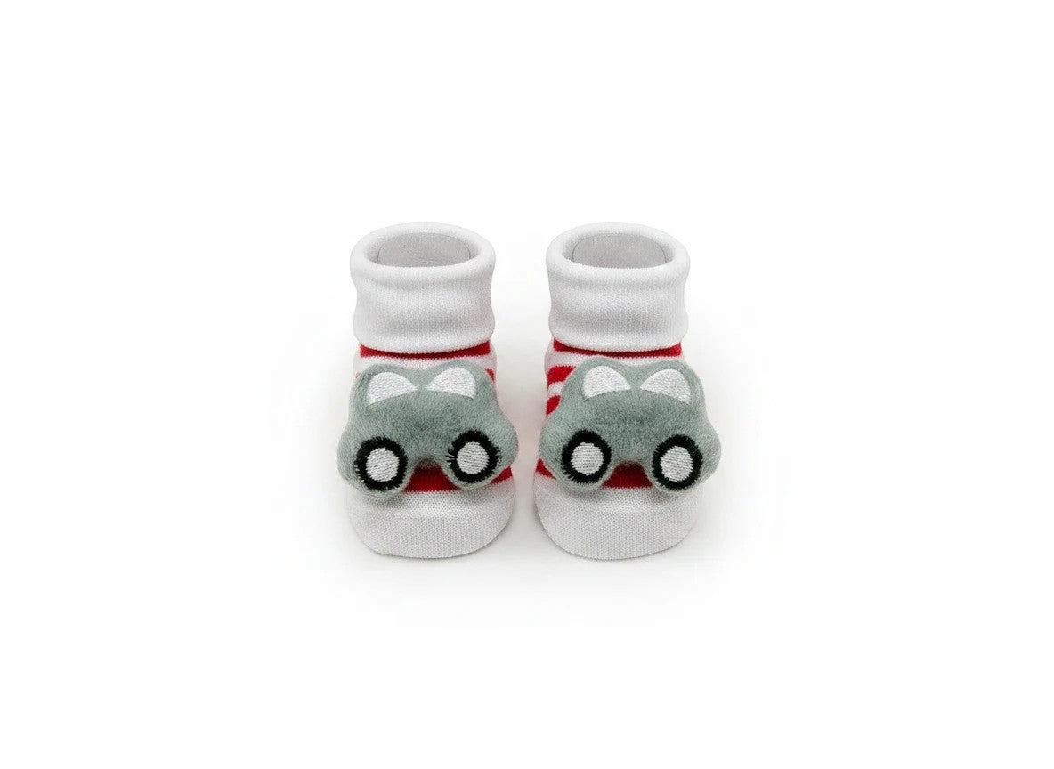 Stork And Baby white and red striped baby socks with grey car rattle detail. Soft cotton blend.