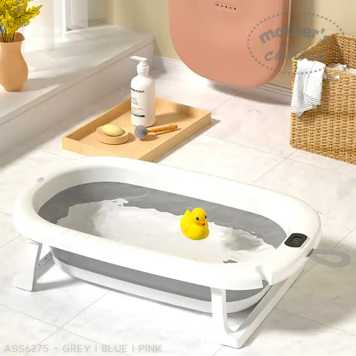 Stork and Baby foldable grey baby bath tub with integrated cushion and digital temperature display for newborns.