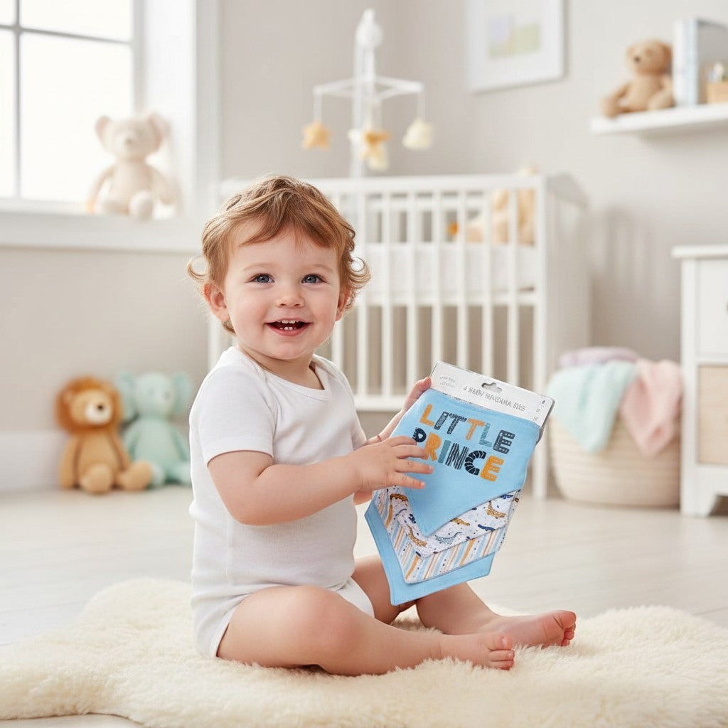 Stork And Baby 100% cotton 4 pack bandana bibs in blue with crocodile and 'Little Prince' print. For baby feeding.