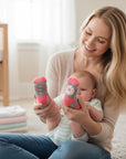Stork And Baby 4 pack baby socks with pink, grey, and green doughnut pattern. Soft, stretchy, and gentle for newborns.