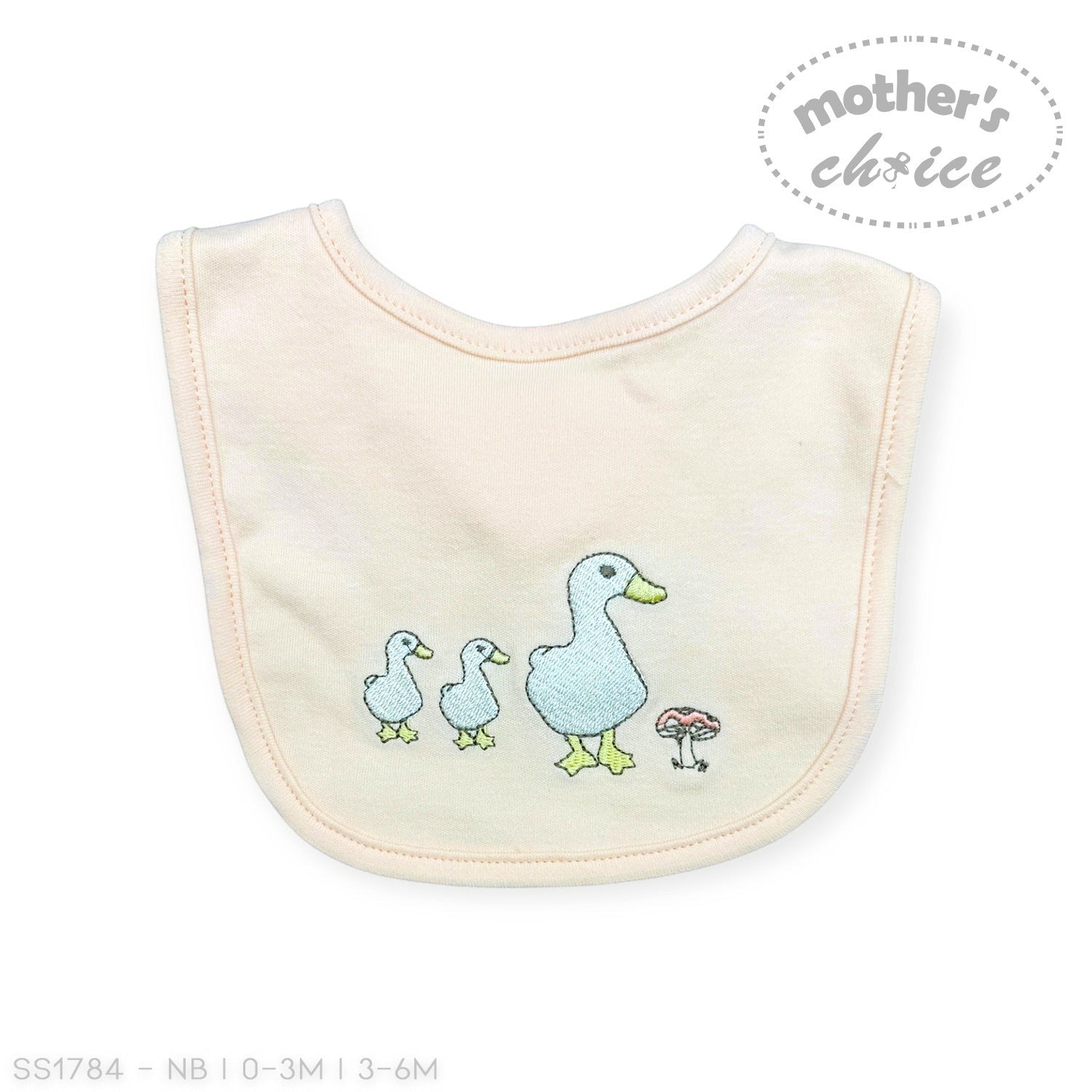 Stork And Baby light peach cotton interlock bib with embroidered ducks and a mushroom.