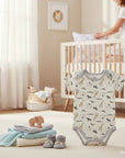 Stork And Baby 5 piece newborn gift set with grey elephant theme, including bodysuit, pants, socks, bib, and cap. Soft cotton blend.