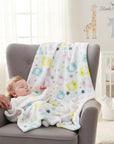 Stork And Baby white polyester baby blanket with pink, yellow, and teal elephant print and stars.