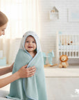 Stork And Baby light blue 100% cotton baby hooded towel with Brave Adventurer embroidery, soft and absorbent