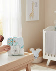 Stork And Baby hooded towels and facecloths set with daisy and sunflower prints in white and aqua