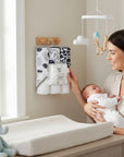 Stork And Baby 6-piece baby bath set with 3 hooded towels and 3 facecloths in milk bottle print. Soft, absorbent cotton.
