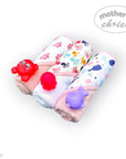 Stork And Baby 3 pack of soft baby hooded towels with colourful whale, crab, and octopus prints and matching toys