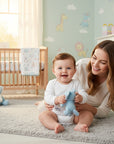 Stork And Baby white long sleeve infants bodyvest made of soft cotton, perfect for layering and everyday wear.