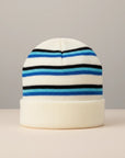 Stork And Baby infants winter hat in cream with blue and black stripes, cuffed brim