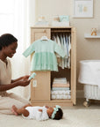 Stork And Baby mint green long-sleeve baby dress with tiered tulle skirt and matching headband.