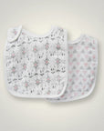 Stork And Baby 2 pack muslin bibs with white, grey, and pink arrows and heart patterns. Lightweight and breathable.