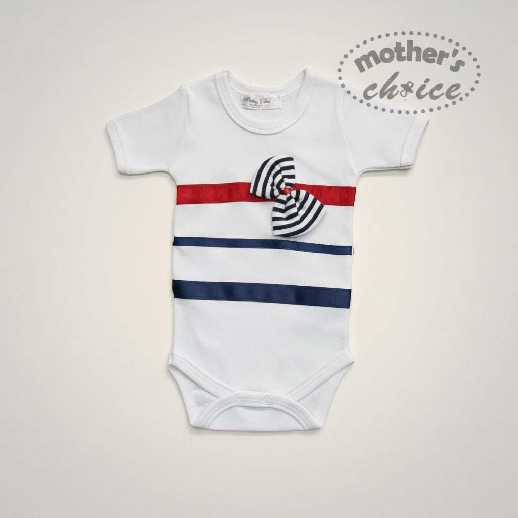 Stork And Baby white cotton romper for girls with red, navy, and striped bow detail. Nautical style.