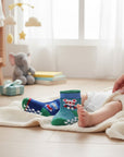 Stork And Baby boys' 2-pack non-slip socks with blue and green stripes and mouse graphics. Soft, grippy bottoms.