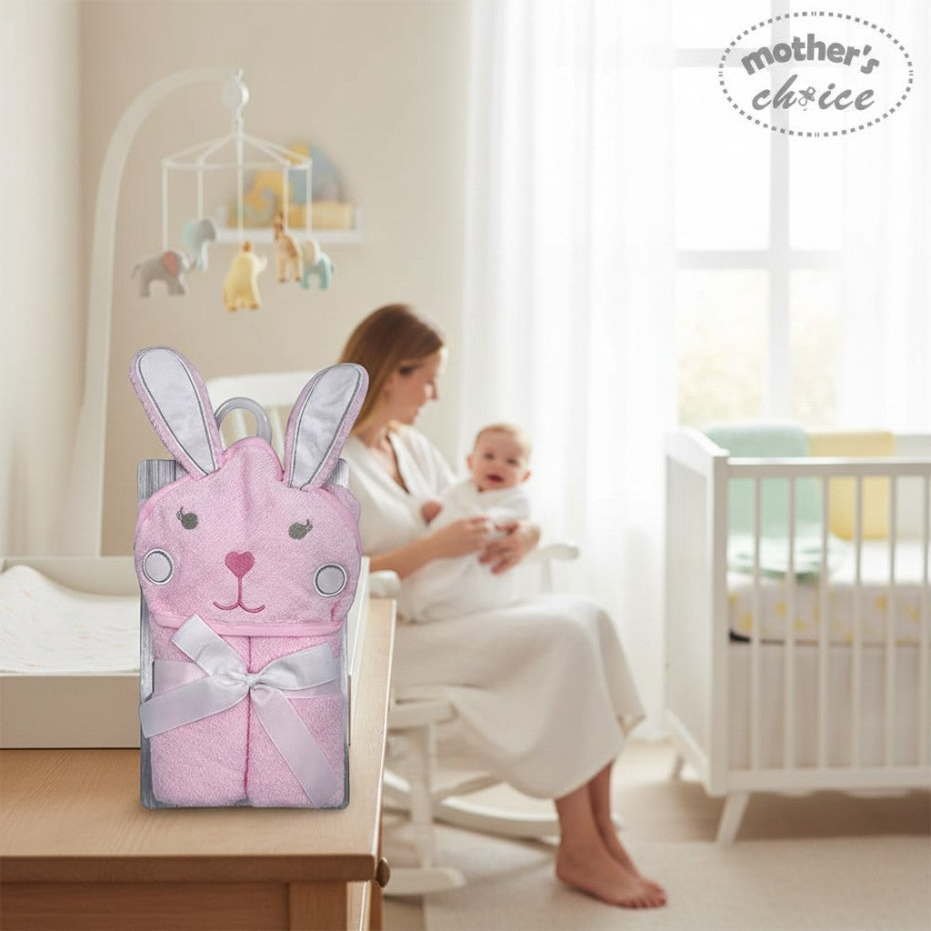 Stork And Baby pink 100% cotton baby hooded towel with bunny ears and face, tied with a ribbon.