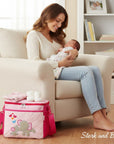 Stork and Baby Mothers Choice Small Pink Diaper Bag Elephant with pink and grey elephant applique and heart details.