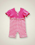 Stork And Baby pink polka dot and striped romper with sailboat embroidery and ruffled waist. Short sleeves.