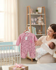 Stork And Baby pink star print infant grower with brushed inner for cozy comfort and warmth.