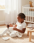 Stork And Baby 5 piece starter pack with Stone Truck design, 100% cotton, for newborns.