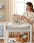Stork And Baby beige waffle knit 2-piece set with bear and mountain graphic, petrol green trim.