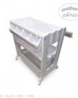 Stork And Baby white plastic baby bath caddy with storage shelves, drainage tube, and lockable wheels
