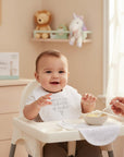 Stork And Baby white 100% cotton bib with 'You're My Definition Of Perfect' text and heart graphic.