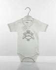 Stork And Baby white 100% combed cotton baby girl's romper with "Little Princess" embroidery and crown detail.