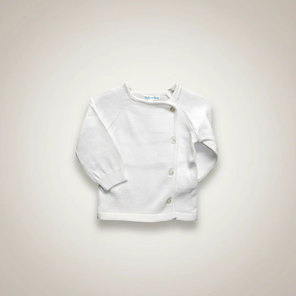 Stork And Baby white knit infant cardigan with button front and raglan sleeves. Soft and comfortable for babies.