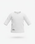 Stork And Baby white long sleeve infant vest with a small oval logo on the lower left side.