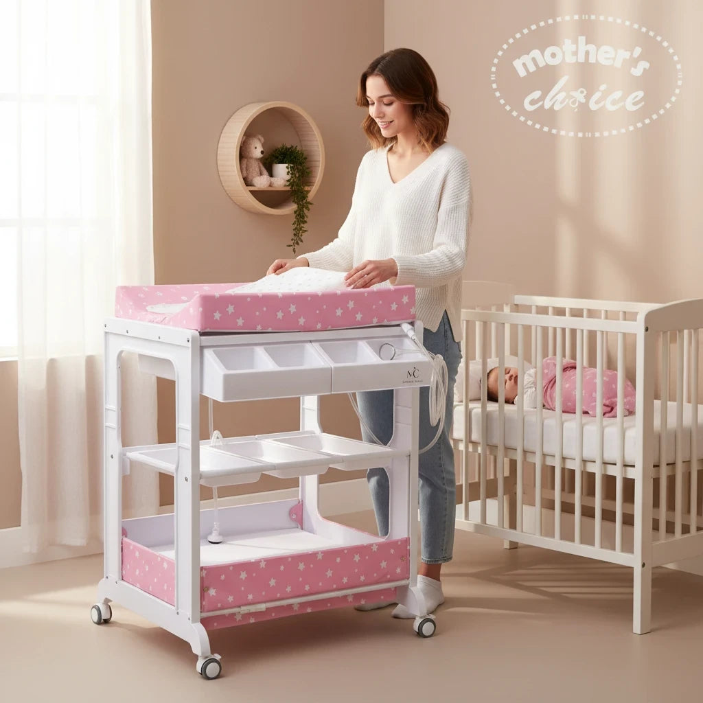 Stork And Baby white and pink star print baby bath caddy with changing mat and storage shelves in a nursery