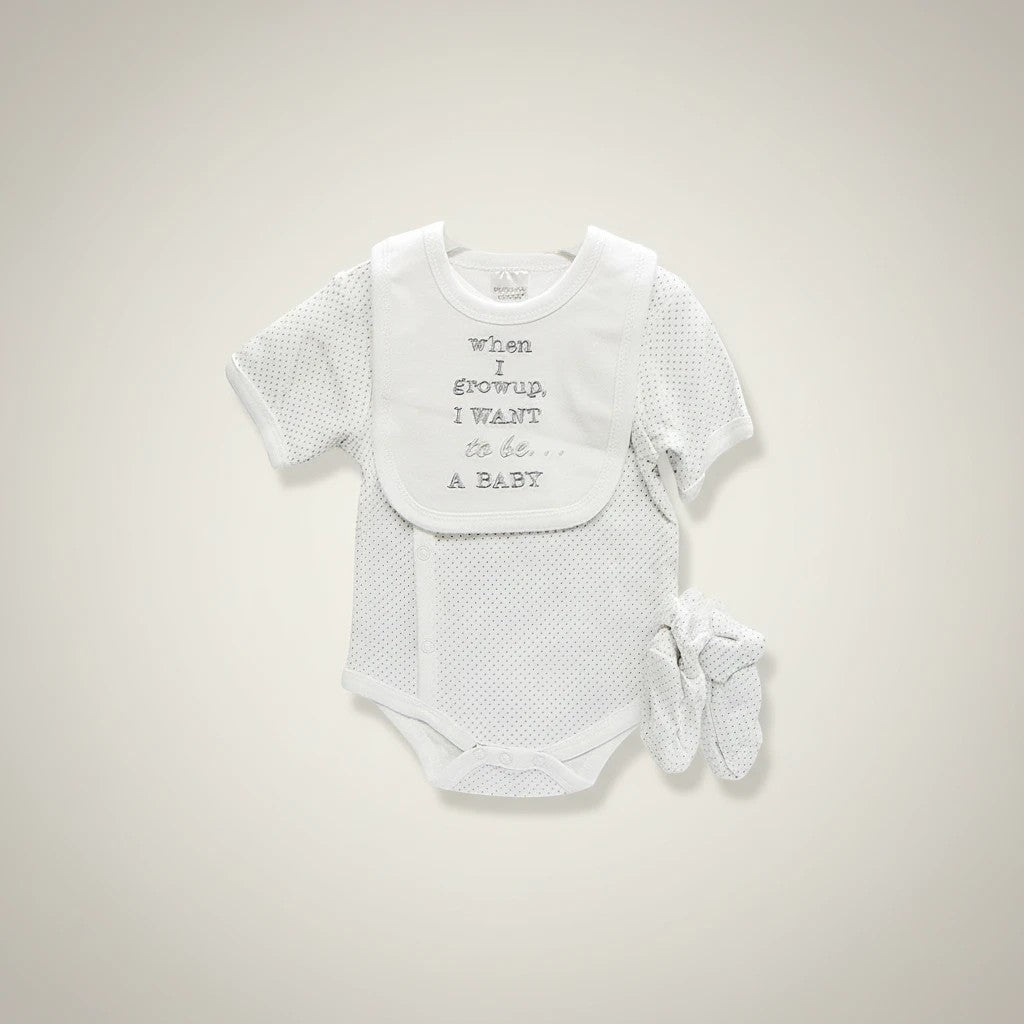 Stork And Baby white dotted romper with bib and mittens. Bib says "when I growup, I WANT to be... A BABY".