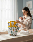 Stork And Baby insulated bottle warmer bag with a fun zoo animal print and yellow trim, perfect for travel.